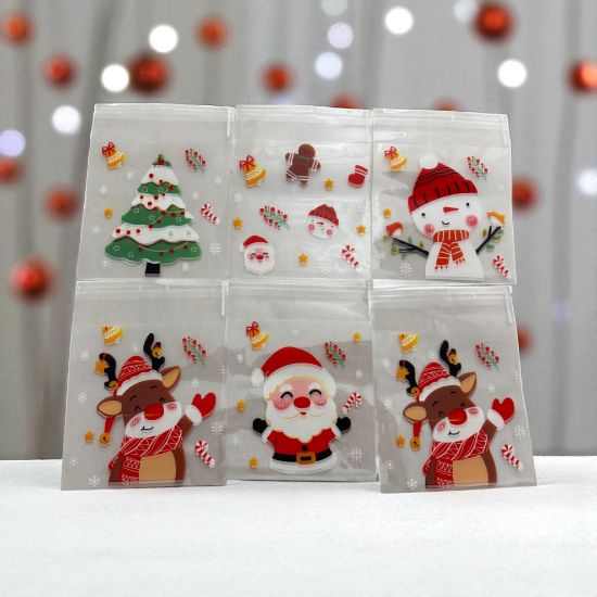 Picture of 25 x  self adhesive mini Christmas treat bags clear with santa, snpwman reindeer etc