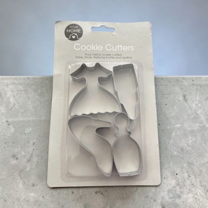 Picture of 4 x metal cookie cutters - shoe, dress perfume bottle lipstick shapes New